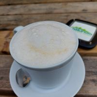 Cappuccino with Oatly oat milk at Naturium in Egestorf