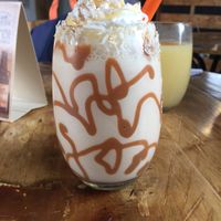 Traditional Venezuelan drink with almond milk and coconut whipped cream at Cumana Bistro Food in Salento