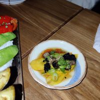 The amazing side dish with yellow carrot in lemon and truffle sauce, topped with mushrppm and vegan caviar. Very tasty #Veganuary at Nami in Varberg