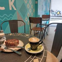 Flat white & vegan chocolate flapjack at Baba Ganoush in Kendal