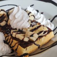 Waffles with banana and chocolate hazelnut at Prana Cafe in Leicester