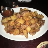 Potato with chili sauce  at Syncopa Bar in Haifa