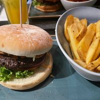 „Glücksgefühle“ (vegan Umami burger) and french friess  at Hans im Glück in Bonn