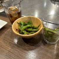 Fried edamame with chili and garlic  at Kamehameha - かめはめは in Kyoto