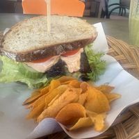 Vegan tempeh bacon sandwich with chips   at Indiana vegan Cafe & Yoga in Langkawi