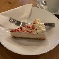 Vegan raspberry and white chocolate cheesecake   at Moments Cafe in Barnard Castle