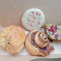 Scone,cinnemon roll (veeeery yummy!),fruit flapjack and a biscuit at Moments Cafe in Barnard Castle