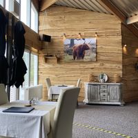 Indoor seating area at De Lier in Schinveld