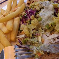 Naan bread savoury main with chips at Karmic Cakery in Berwick-upon-tweed