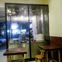 Inside looking out at Falafel Michelin in Bangkok