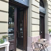 Front view opposite small park at Cube Coffee Bar in Budapest