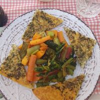 Farinata and vegetables at Centro Botanico in Milan