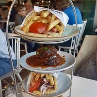 Jackfruit Gyros with Garlic Aioli and Grilled Aubergine in Tomato Sauce  at The Real Greek - Westfield London in West London