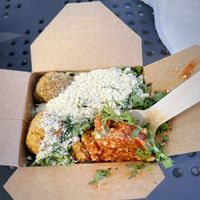 Lentils, black rice, mixed sweet potato and green balls, several toppings .  at Turlaj Klopsa - Food Truck Ruczaj in Krakow