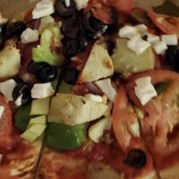 Practically no vegan cheese coverage. at Blue Dog Gourmet Pizza in South Lake Tahoe