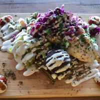 The signature “walafel” Falafel made in waffle iron at The Black Yard in Ormond