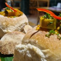 RED CURRY BUNNY CHOW at Little Turtle in Enmore