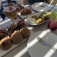 Pulled pork, bruschetta, and potatoes at Katharos Lounge in Santorini