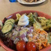Loaded potato with side salad  at Thrive Diner in Pittsfield
