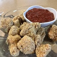 Almond parm cauli nuggets & marinara sauce  at Thrive Diner in Pittsfield