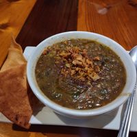 Lemon lentil soup: spinach, potato, lemon, cilantro and pita chips fresh ingredients so tasty! at Kareem's in Naples