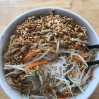 Rice Noodles with tofu, bean sprouts, peanuts, crispy fried onions, veggies and sauce at V-Cuisine in Hanoi