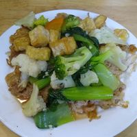 Fried rice noodles with vegetables at V-Cuisine in Hanoi