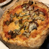 ORTOLANA pizza 
Tomato base, mozzarella, courgettes, aubergine, mixed peppers and basil  at Posillipo - Broadstairs in Broadstairs