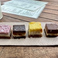A selection of delicious vegan raw cheesecakes (Vegan Food Tour July 2025) at SUE Bakery in Rotterdam