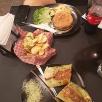 Hamburguesa vegetariana, papas, burrito at Surf Caf in Cancun