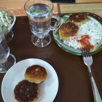 Chickpea patties with rice and tomato chatney at Kurkuma in Krasnodar