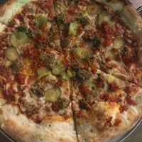 Pickle back pizza with vegan UnMoo cheese and soy sausage. Favorite vegan pizza I’ve had.  at The Hop in Richmond