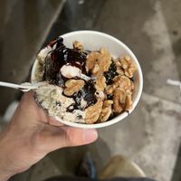 Cookies and cream Carmel swirl with vegan hot fudge and walnuts  at Van Leeuwen Ice Cream - Ludlow in New York City