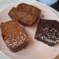 Vegan cakes: banana bread, carrot cake and chocolate cake at Plantate Cafe in Madrid