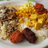 My plate from Hiltl. Not sure what everything is...Züri Geschnetzeltes, channa, tofu egg salad, eggplant based pate, Asian tofu with vegetables, wild rice and jasmine rice. at HILTL - Sihlstrasse in Zurich