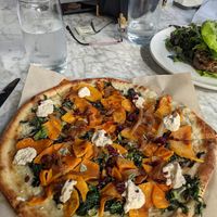 Squash, kale and homemade vegan cheese pizza! at True Food Kitchen in The Woodlands