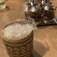 Sticky rice + four cool hot sauces in the background at Thai USA in Huntington