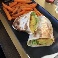 Burrito accompagnato da patate dolci  at Radagast Vegan Bakery in Rome