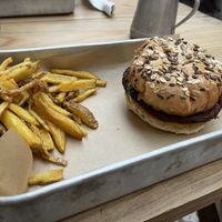 Black Bean Burger mit Fritten  at Grains 864 in Faro