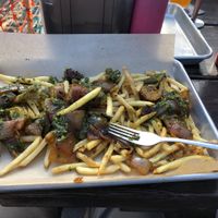Veggie Italian on fries with chimichurri   at Bangers & Brews in Bend