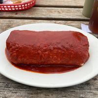 Veggie burrito (vegan) smothered in enchilada sauce! at La Cabana de Raya in Astoria