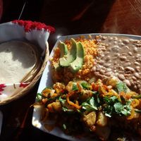 Plate with veggies, refried beans and Spanish rice at La Cabana de Raya in Astoria