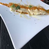 Vegan ravioli with pumpkin and potato sauce. at La Bussola in West Singapore