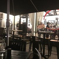 Restaurant at night, taken from outside seating. at La Bussola in West Singapore