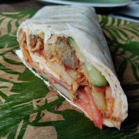 Wrap full of vegetables and fried potato at Manipura Ethic Cafe & Bar in Baku