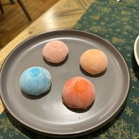 Mango, bubble gum, orange and strawberry mochi   at Manipura Ethic Cafe & Bar in Baku