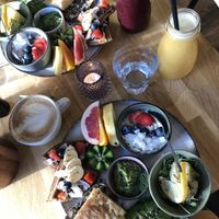 Vegan brunch, cappucino and two different fresh juices.  at Cafe Oha  in Frederiksberg