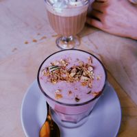 Rose latte, hot chocolate in background at Kattakaffihusid in Reykjavik