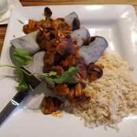 Enchiladas Zapotecas - black corn tortillas filled with guacamole, nopales, salsa, and topped with mushrooms in an adobo sauce. Wow! at Mayahuel in Sacramento