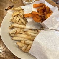 Oven baked fries and sweet potato fries  at B.GOOD - Washington St in Boston